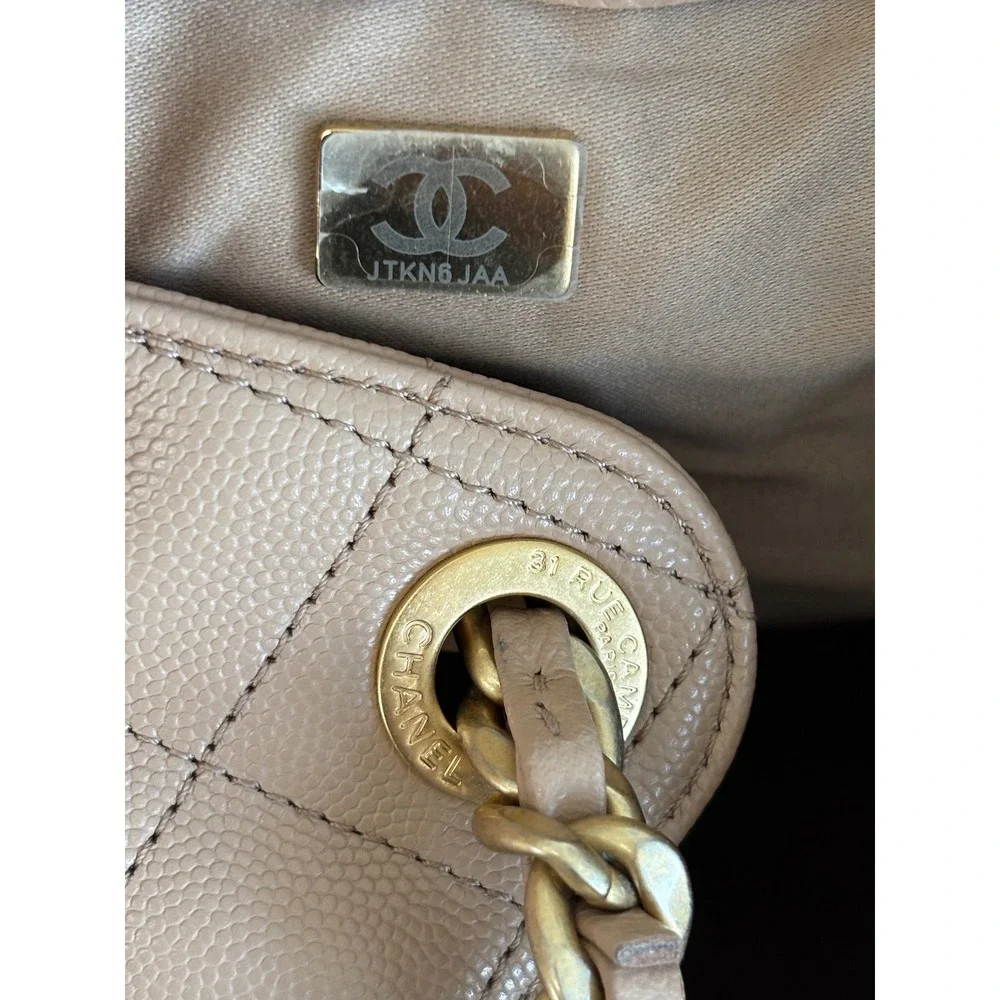Chanel 25 Quilted Caviar Leather Beige Gold Hardware Drawstring CC, medium siz